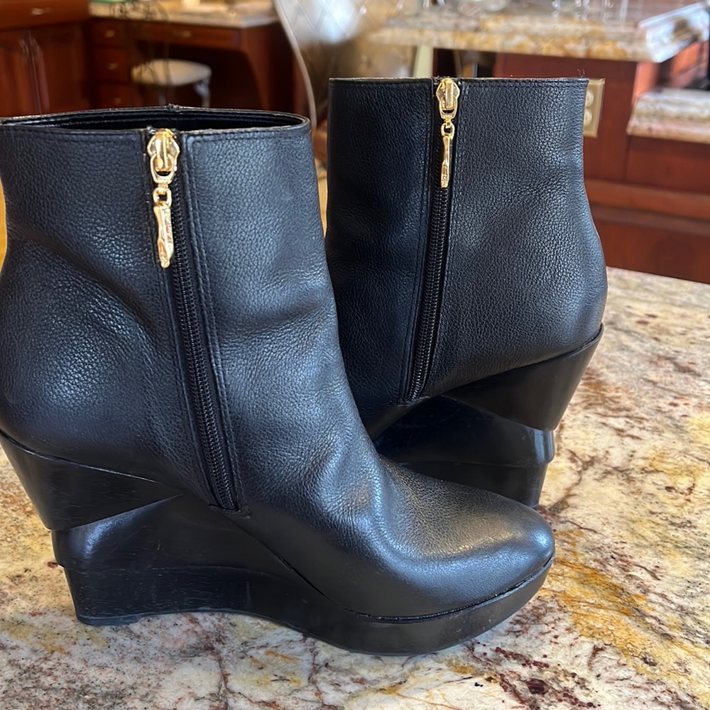 Diane Von Furstenberg black booties w/ gold zippers